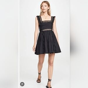 Free People black lace mini dress. Size Small.
